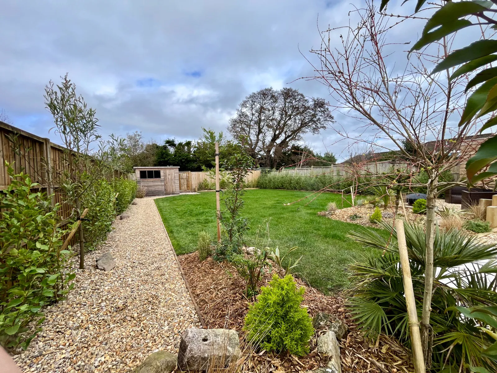 New hedging and gravel pathway at High Beach Holiday Let in Berrow near Brean, enhancing privacy and outdoor living space