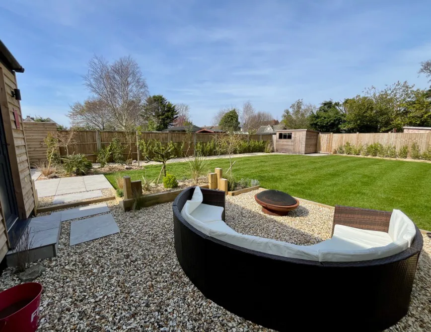 New gravel pathway and landscaped garden borders at High Beach holiday cottage near Brean Beach in Somerset